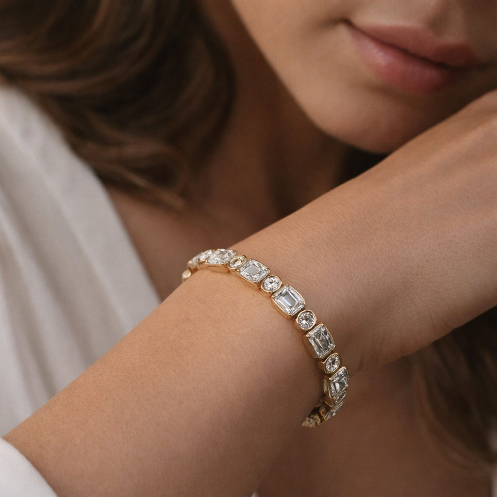 8.08 Carat 14K Gold Emerald and Round Brilliant Cut Bracelet