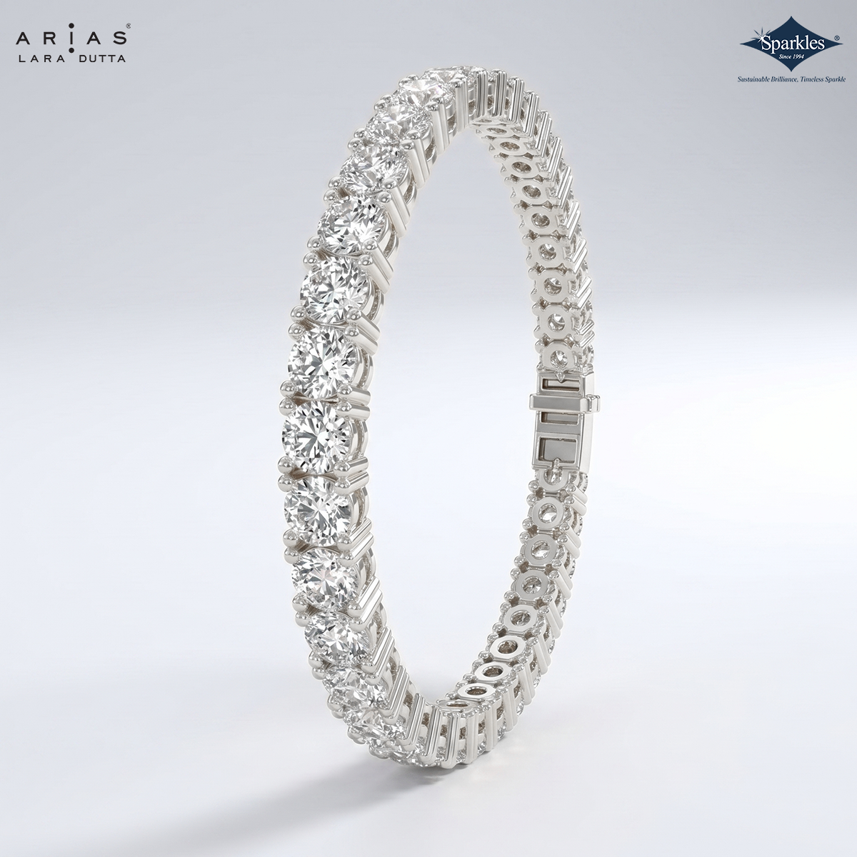Silver bracelet with diamond accents on a light gray background