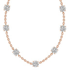 Rose gold necklace with diamond-like stones on a white background