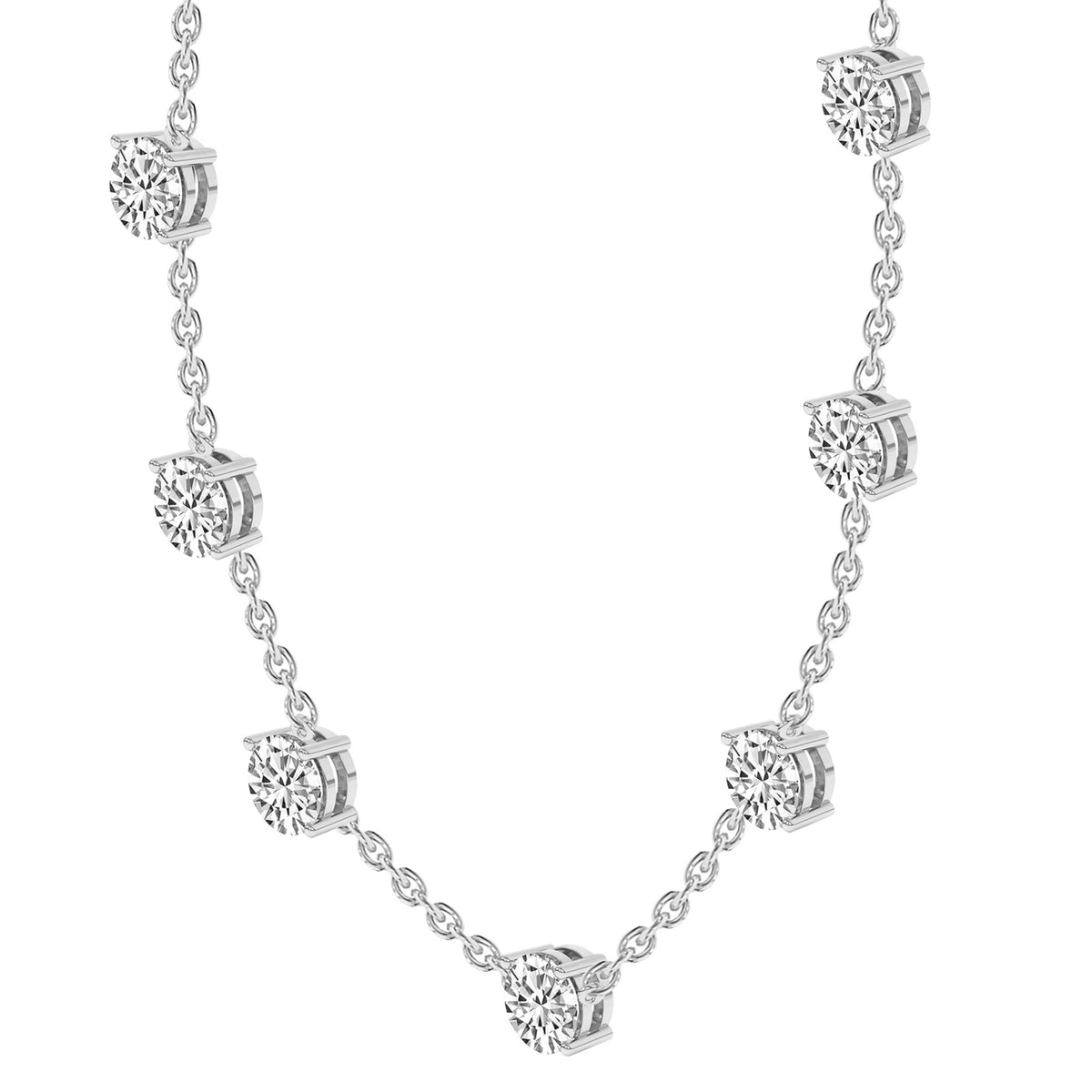 Silver necklace with diamond pendants on a white background