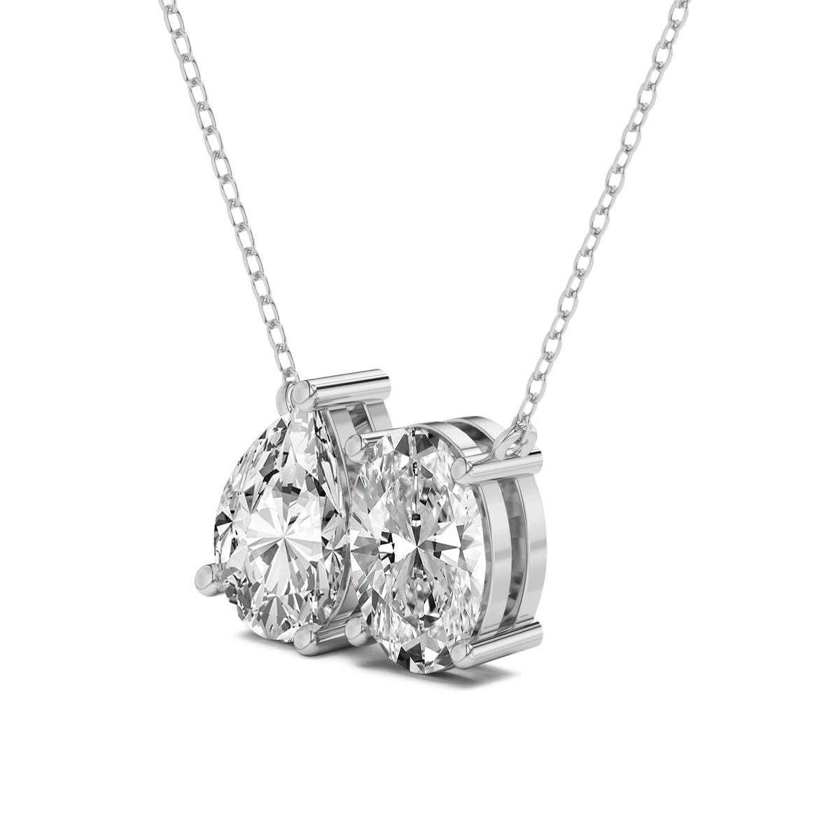 Diamond necklace with two heart-shaped gemstones on a white background
