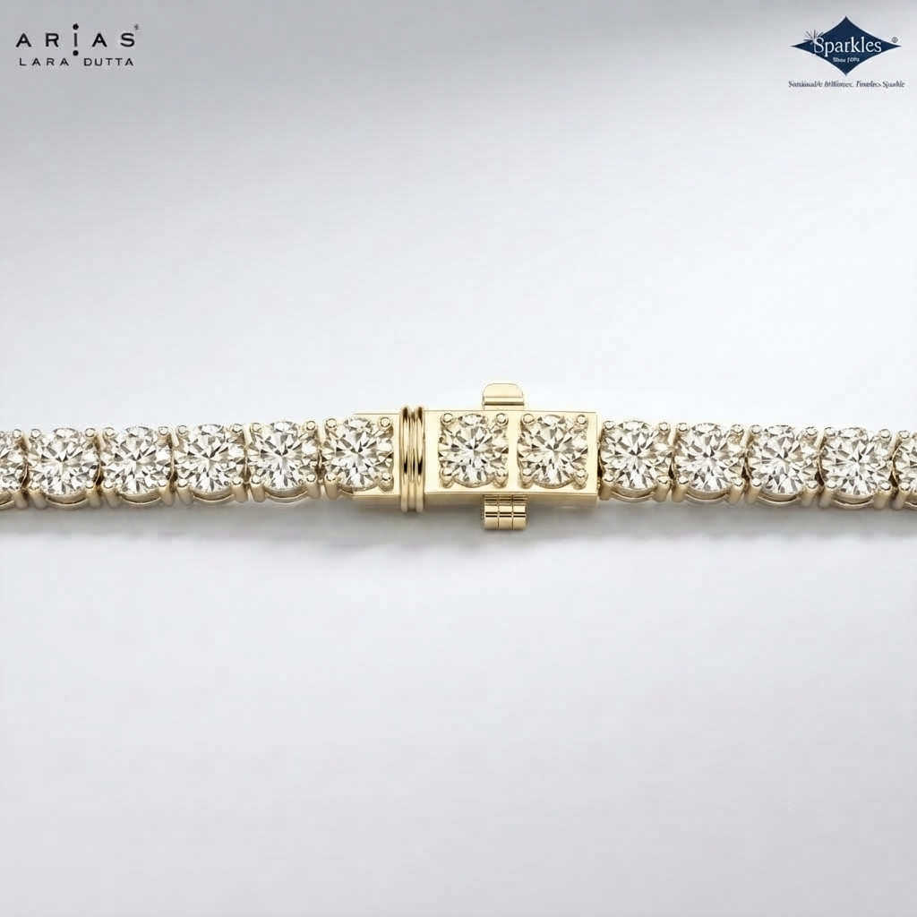 A close-up of a gold tennis bracelet with clear round-cut gemstones, showing the clasp and side links on a light gray background. The ARIAS LARA CUTTA logo is in the top-left corner, and the Sparkle Certified Gemstone logo is in the top-right.