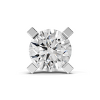 A classic round brilliant-cut diamond solitaire engagement ring in a four-prong silver setting, shown on a clean white background with a soft shadow.