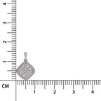 A diamond pendant in a silver-toned square bezel setting, shown next to a centimeter ruler to indicate its small size.