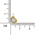 Gold heart-shaped pendant with textured surface on a white background with measurement scale.