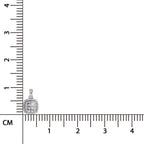 A small square pendant with a silver-toned border and clear stones, shown next to a centimeter ruler for scale on a white background.
