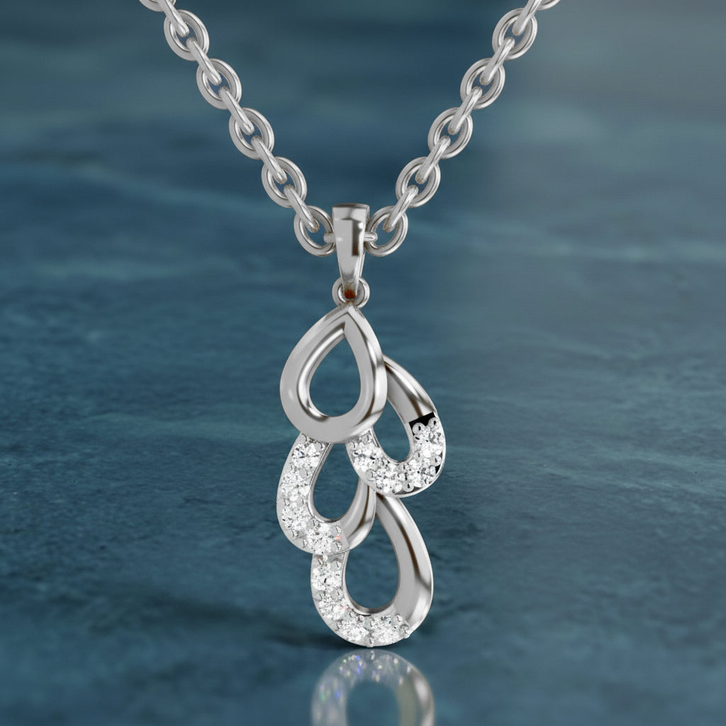 Silver necklace with a detailed pendant against a blue water background