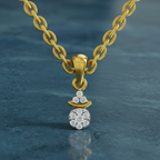 Gold necklace with a diamond pendant on a dark blue background