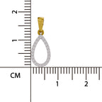 Gold and silver teardrop-shaped pendant with measurement scale in centimeters