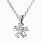 Diamond flower pendant on a chain against a white background