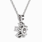 Silver necklace with a intricate pendant on a white background