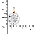A round yellow gold pendant with a cluster of clear gemstones in the center and a halo of smaller stones around the edge, shown next to a centimeter ruler for scale on a white background.
