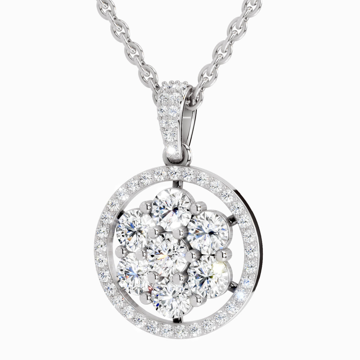 A silver-tone round pendant necklace featuring a floral cluster of clear round-cut stones surrounded by a halo and a double-ring border, suspended from a matching chain on a light gray background.