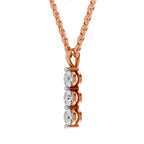 A rose gold necklace with a vertical pendant featuring three round-cut clear gemstones in a wavy setting, suspended from a matching rose gold chain against a plain white background.