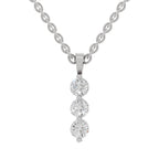 A silver-tone chain necklace with a vertical pendant featuring three round clear gemstones in a drop arrangement, shown on a plain white background.