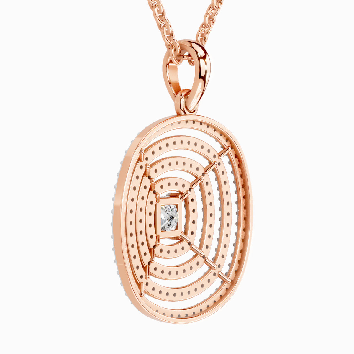 Rose gold oval pendant necklace with concentric geometric filigree patterns and a small central clear gemstone, shown on a white background.