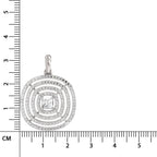 A silver-toned square pendant with concentric diamond-cut borders and a central princess-cut gemstone, shown next to a black ruler with centimeter markings on a white background.