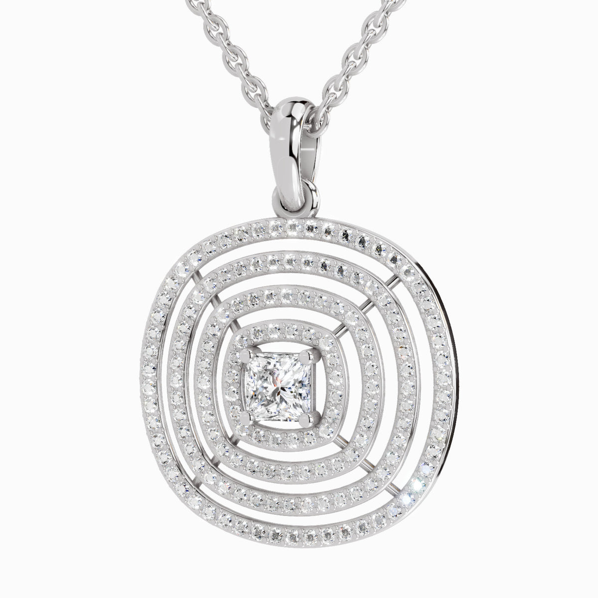 A silver-toned round pendant necklace featuring a central princess-cut clear gemstone surrounded by concentric rings of small pavé-set clear stones, suspended from a matching chain on a light gray background.