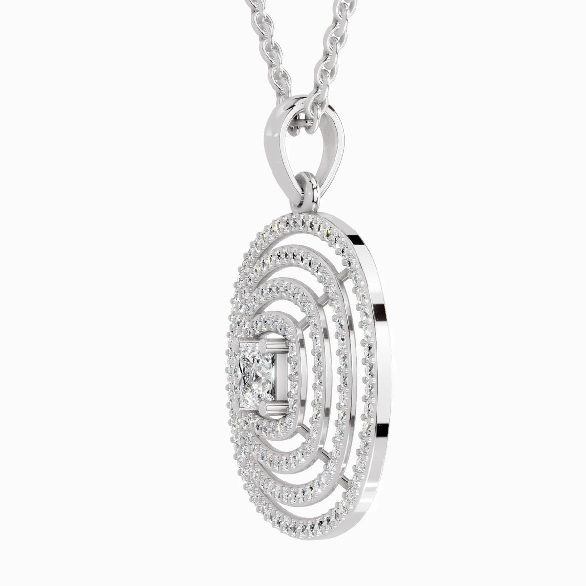 A silver-toned oval pendant necklace featuring concentric halo rings and a central diamond, suspended from a matching chain against a light gray background.
