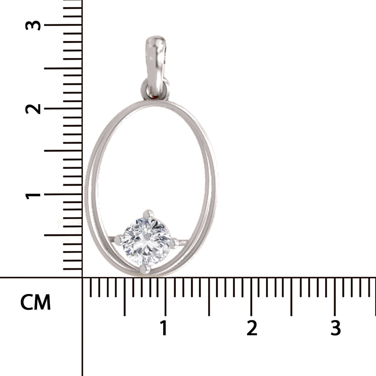A silver oval pendant with a single clear round-cut gemstone, shown next to a centimeter ruler for scale on a white background.