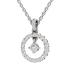 A silver-tone necklace with a double-ring pendant, one of which is a small round solitaire diamond, on a plain white background.