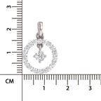 A silver pendant with a halo-style circular design and a central diamond, shown next to a centimeter ruler for scale on a white background.