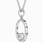 Silver pendant necklace with clear gemstones on a white background
