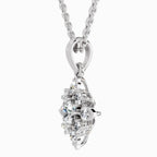 Silver heart-shaped pendant with clear stones on a white background