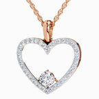A rose gold heart-shaped pendant necklace with a pavé diamond border and a central solitaire diamond, shown on a clean white background.