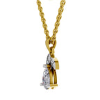 Gold necklace with a diamond pendant on a white background
