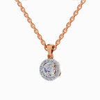A rose gold chain necklace with a round pendant featuring a halo of small clear stones around a central round-cut clear gemstone, shown on a plain white background.