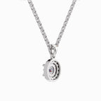 A silver-toned chain necklace with a circular pendant featuring a clear faceted gemstone in the center, shown on a plain light gray background.