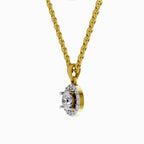 Gold necklace with a diamond pendant on a white background