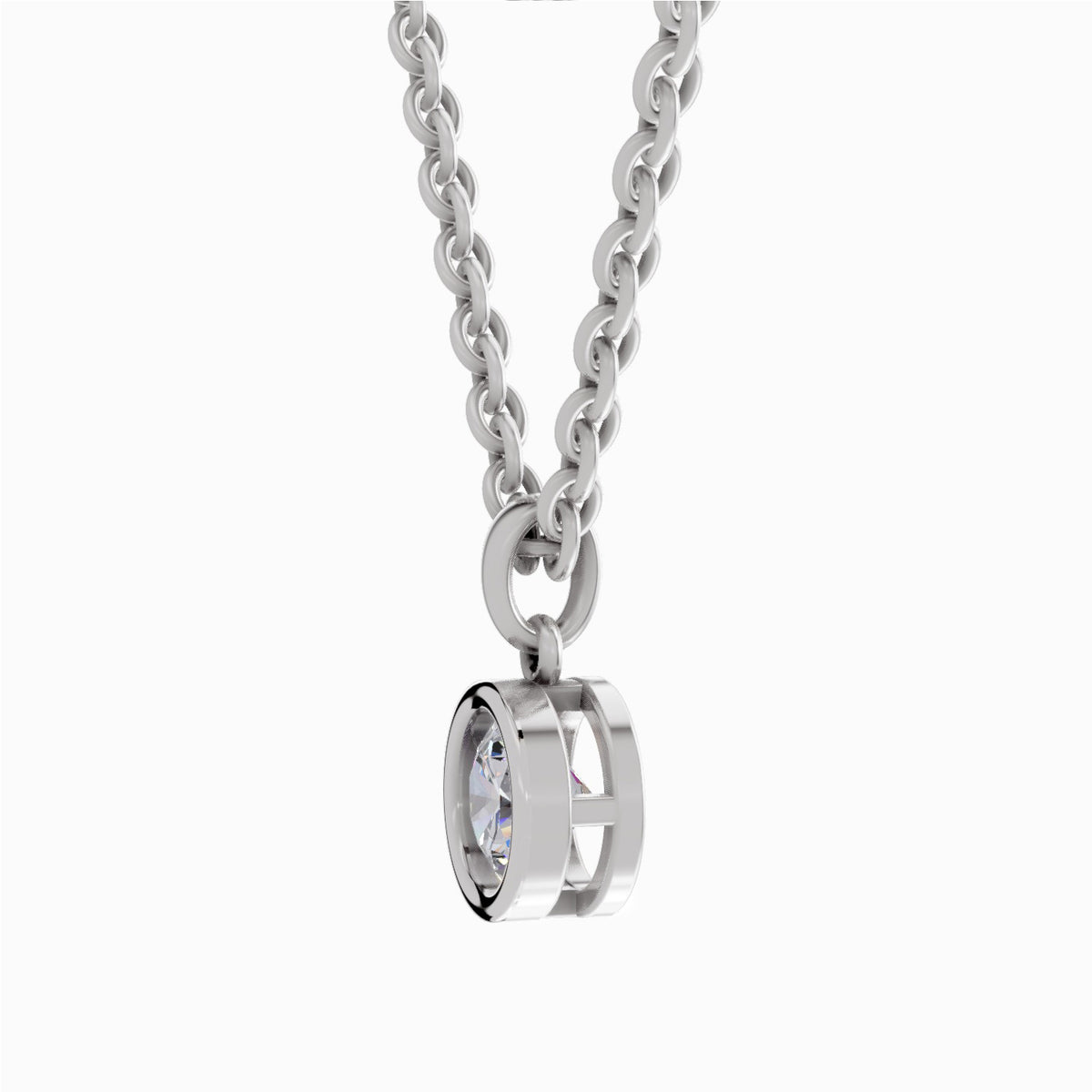 A silver-toned necklace with a curb chain and a double-ring bezel pendant holding a clear faceted gemstone, shown against a plain white background.