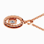 Rose gold pendant necklace featuring a double-ring design with a central clear gemstone and small accent stones, shown on a white background.