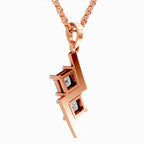 Rose gold pendant necklace featuring a geometric design with two inset square clear gemstones, suspended from a matching rose gold chain against a plain white background.