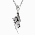 A silver geometric pendant necklace featuring two square-cut clear gemstones set in a modern, angular silver design, suspended from a silver link chain against a plain white background.