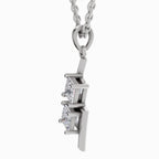 A silver pendant necklace featuring three clear marquise-cut gemstones set in a geometric silver frame, suspended from a silver link chain against a plain white background.