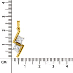A yellow gold pendant with two princess-cut clear stones, shown next to a centimeter ruler for scale on a white background.