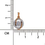 A rose gold pendant with a central round clear gemstone and a surrounding halo of small clear stones, shown next to a centimeter ruler for scale on a white background.