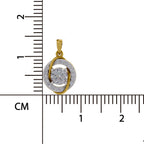 A gold and white stone pendant shown next to a centimeter ruler for scale, featuring a round clear center stone surrounded by a halo of small white stones in a gold setting.