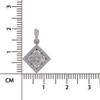 A diamond pendant with a silver-toned halo and bail, shown next to a centimeter ruler for scale on a white background.