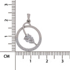 A silver pendant with a marquise-cut clear gemstone and a circle accented with small clear stones, shown next to a centimeter ruler for scale on a white background.