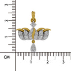 A yellow gold and white gold pendant with clear pavé diamonds, shown next to a black measurement ruler in centimeters to indicate its size.
