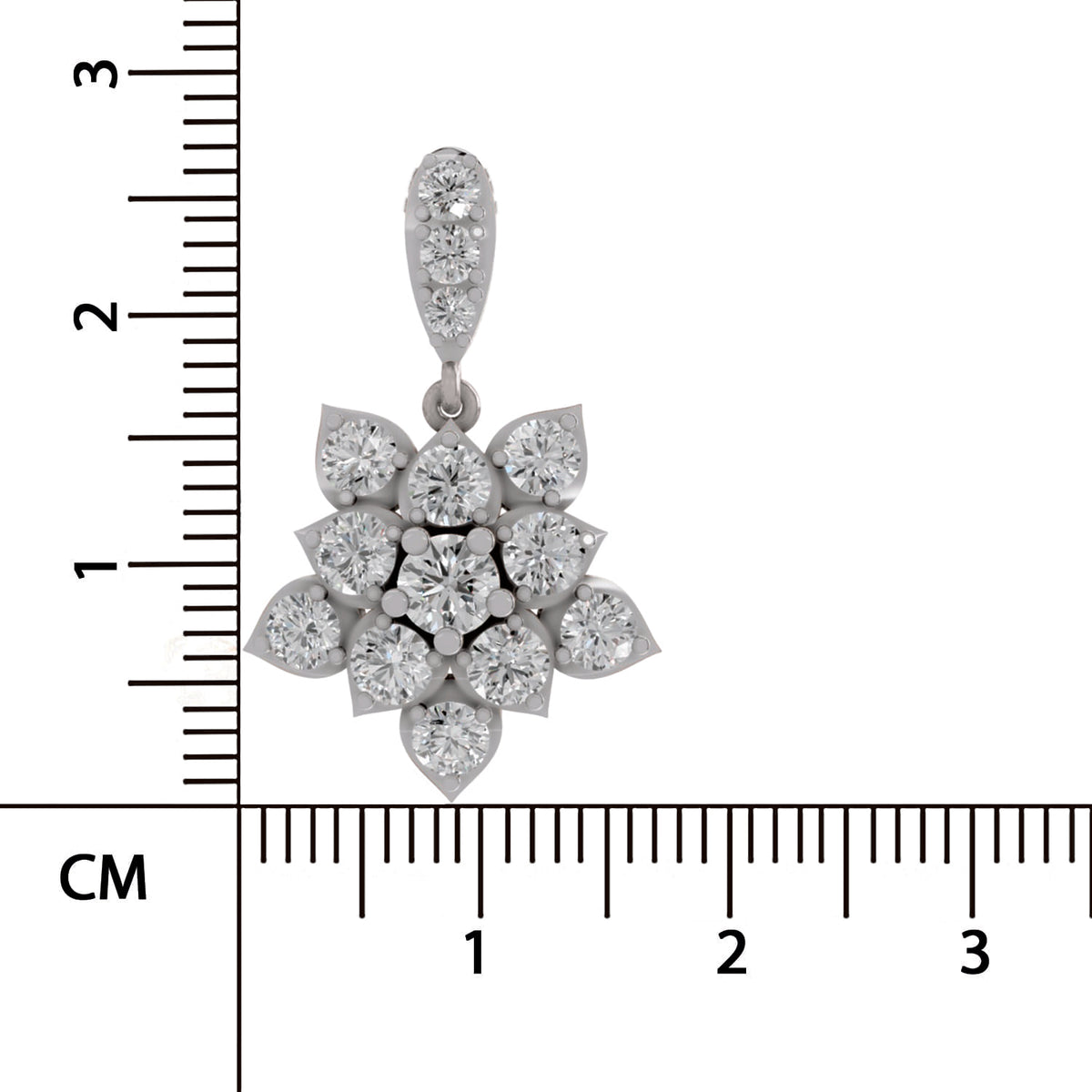 A silver-toned flower-shaped pendant with clear gemstones, shown next to a black ruler with centimeter markings to indicate scale on a white background.