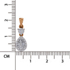 A teardrop-shaped pendant with a rose gold bail and a round cluster of clear stones above a larger pear-shaped cluster, shown next to a centimeter ruler for scale on a white background.