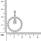 A silver-tone pendant and matching stud earring set with clear stones, shown on a white background with a centimeter ruler for scale.