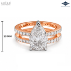 A rose gold double-band ring set with a large pear-cut center stone and pavé-set diamonds, shown on a white background with brand logos 'Ariás Lara Dutta' and 'Spinkle' plus a 13 MM width measurement marker.