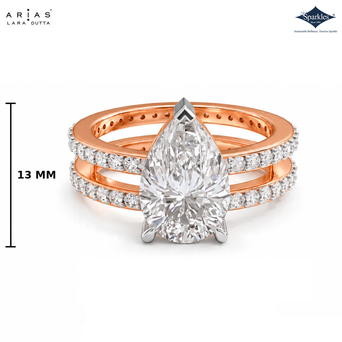 A rose gold double-band ring set with a large pear-cut center stone and pavé-set diamonds, shown on a white background with brand logos 'Ariás Lara Dutta' and 'Spinkle' plus a 13 MM width measurement marker.