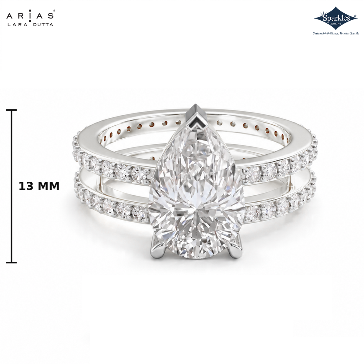 A silver-tone double-band ring set featuring a large pear-cut diamond center stone and smaller pavé diamonds along the bands, shown on a white background with brand logos and a 13 mm height marker.